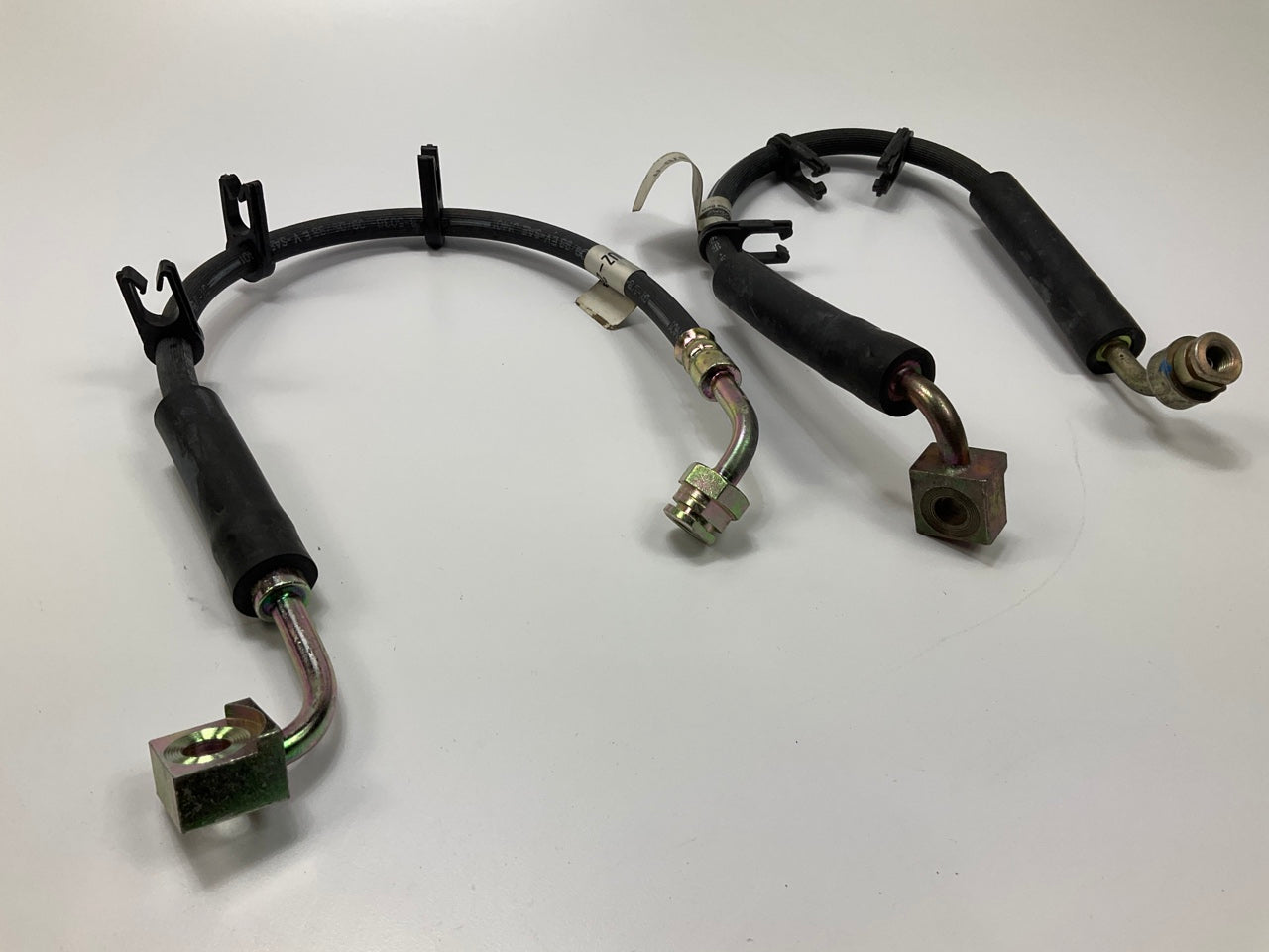 NEW OEM Ford F5UZ-2078-A / F5UZ-2078-B Front Left & Right Brake Hose Set