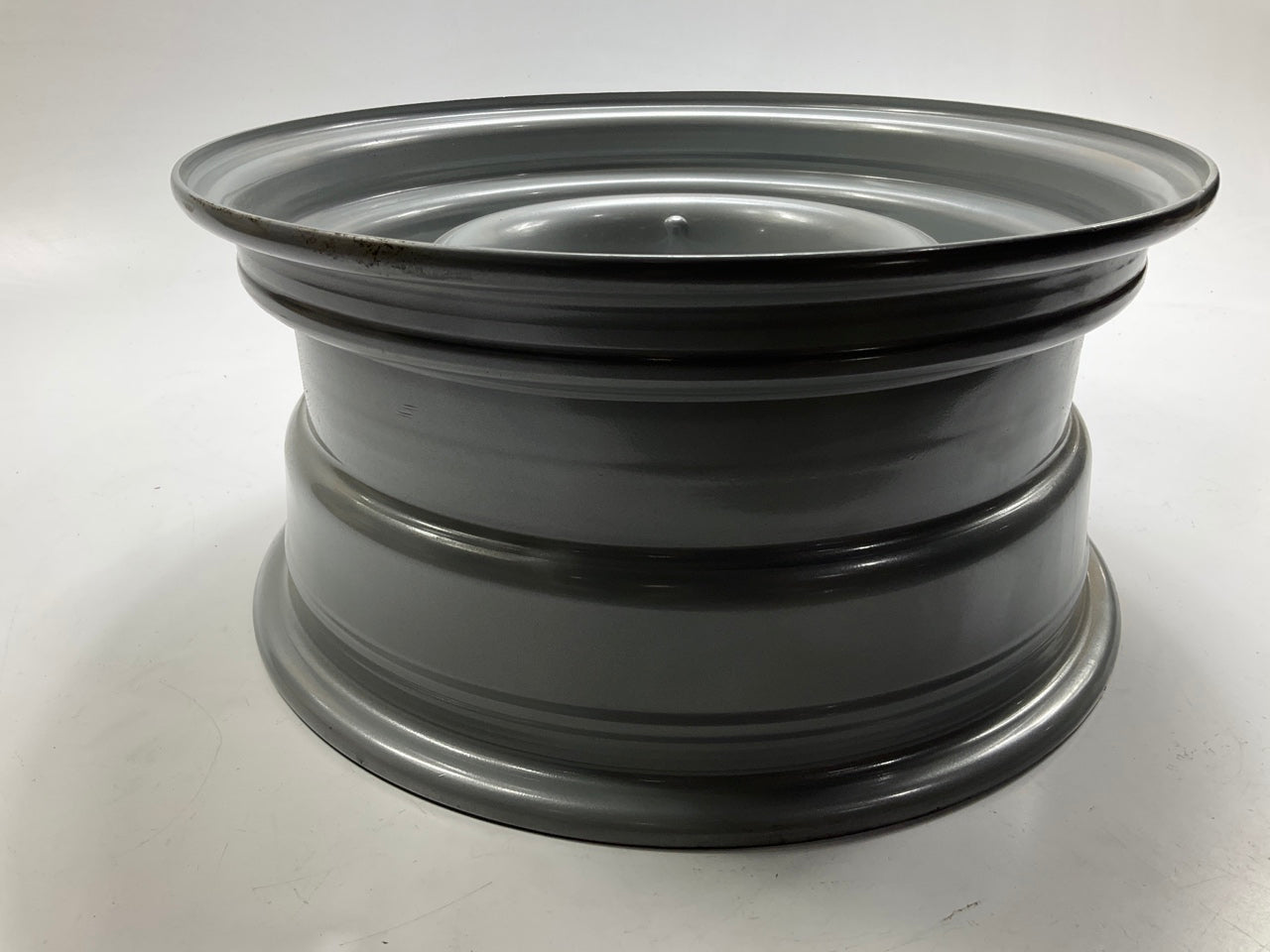 Carlisle 144-5753P 15''x7'' Steel Wheel, 5x5'' & 5x5.5'' Bolt Pattern
