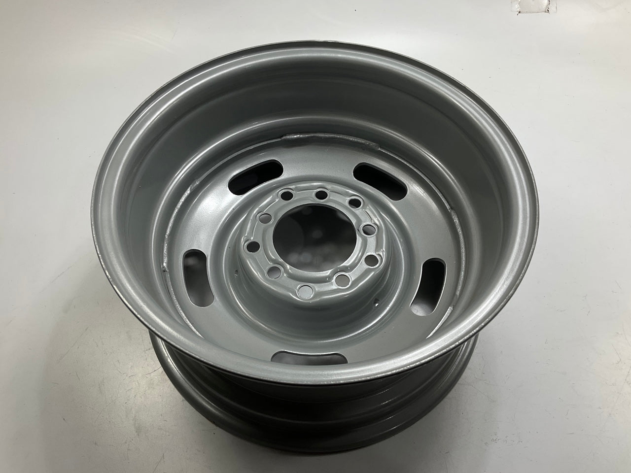Carlisle 144-5753P 15''x7'' Steel Wheel, 5x5'' & 5x5.5'' Bolt Pattern
