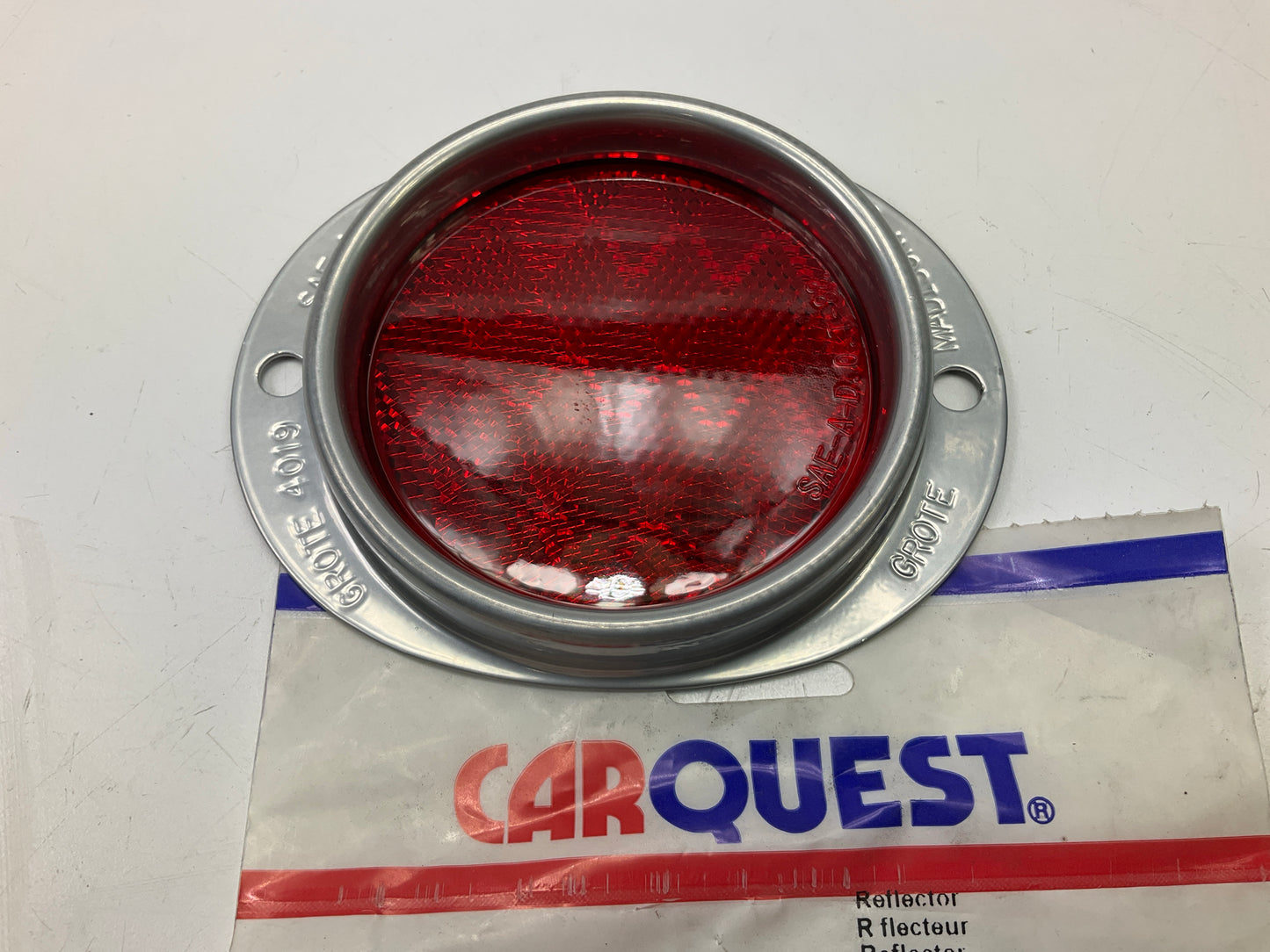 Grote 40192 Red/Silver Steel Two-Hole Mounting Red Trailer Reflector, 3'' Lens