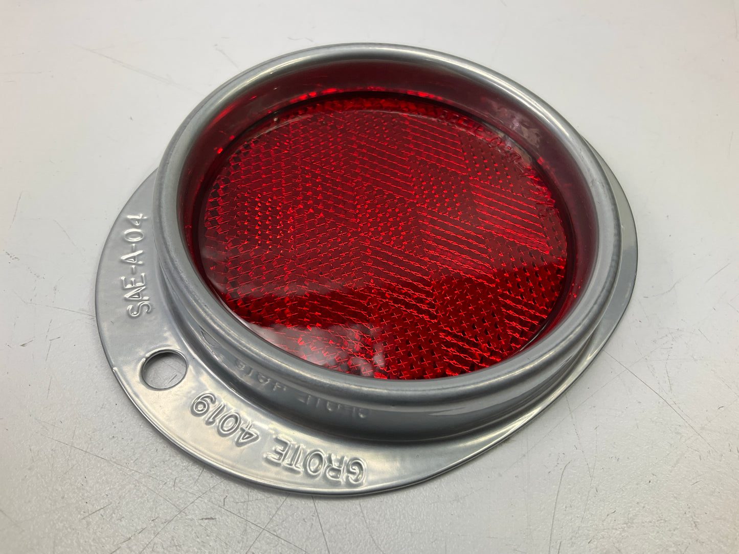 Grote 40192 Red/Silver Steel Two-Hole Mounting Red Trailer Reflector, 3'' Lens