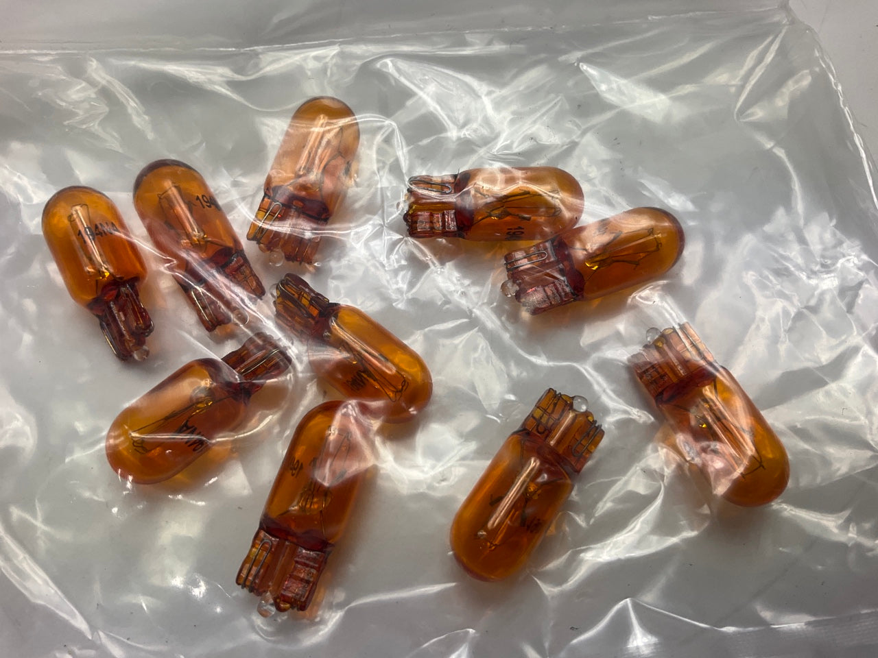 (10) Champion 194NA Minature Light Bulb Amber - Wedge T-3 1/4 14V 3.78 Watt