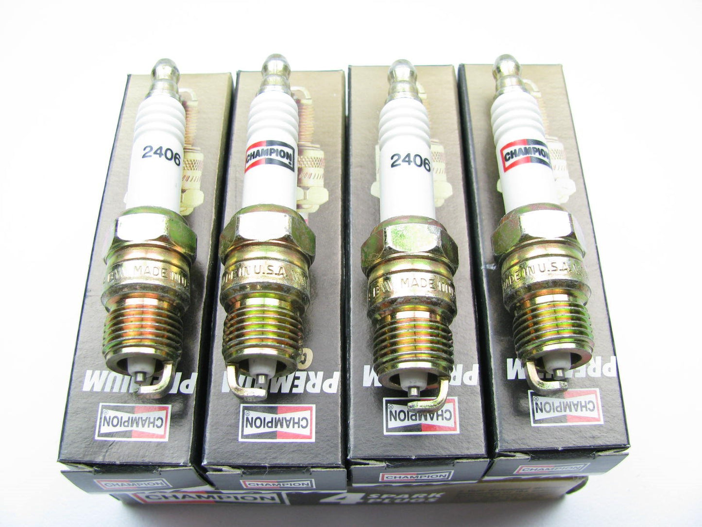 (4) Champion 2406 Spark Plugs