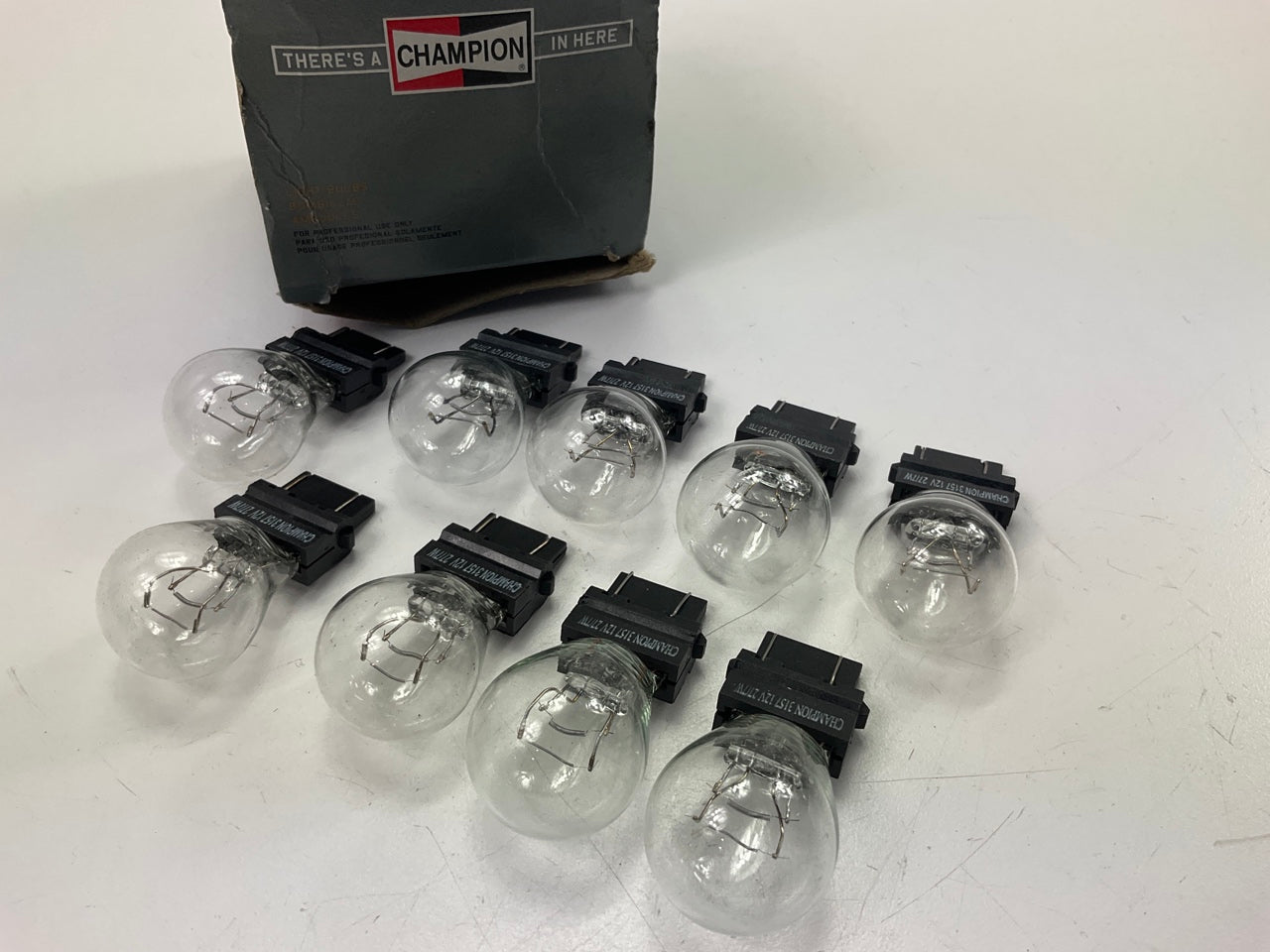(9) Champion 3157 Brake Lamp Light Bulb