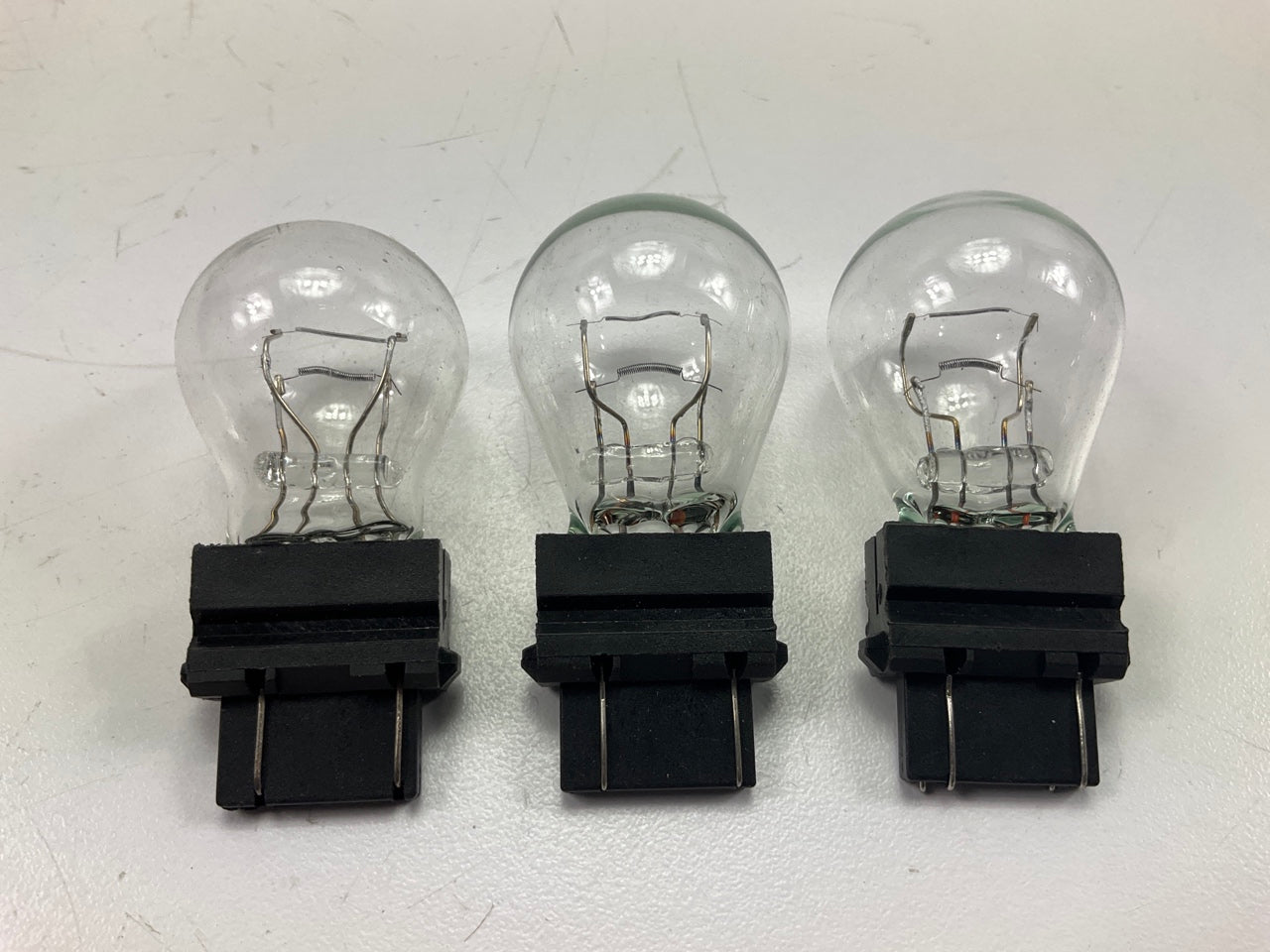 (9) Champion 3157 Brake Lamp Light Bulb