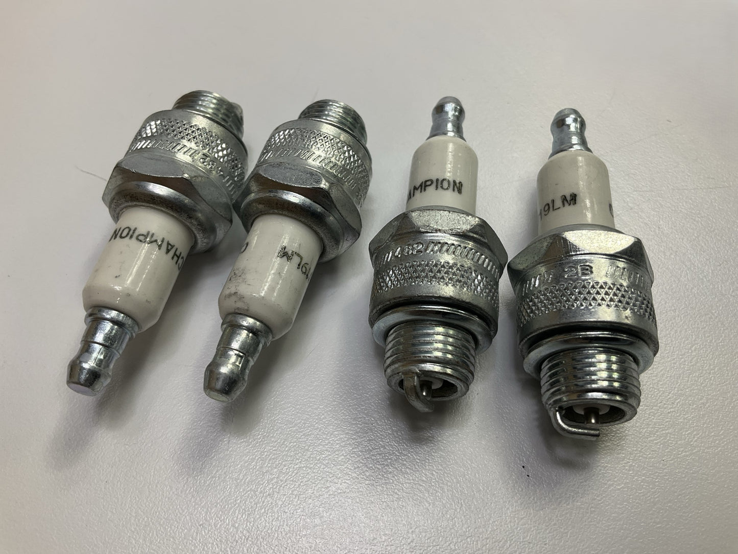 (4) Champion 861 Copper Plus Non-Resistor Spark Plugs - J19LM