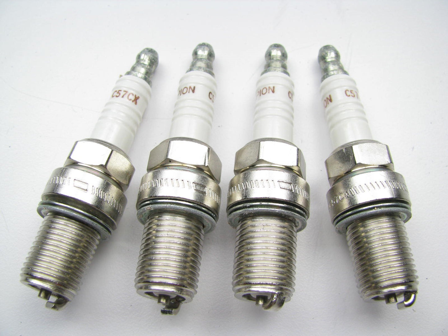 (4) Champion C57CX Racing Spark Plugs  # 295