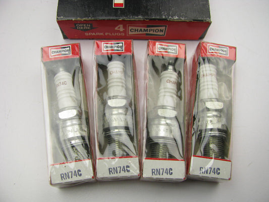 (4) Champion RN74C Spark Plugs   # 323