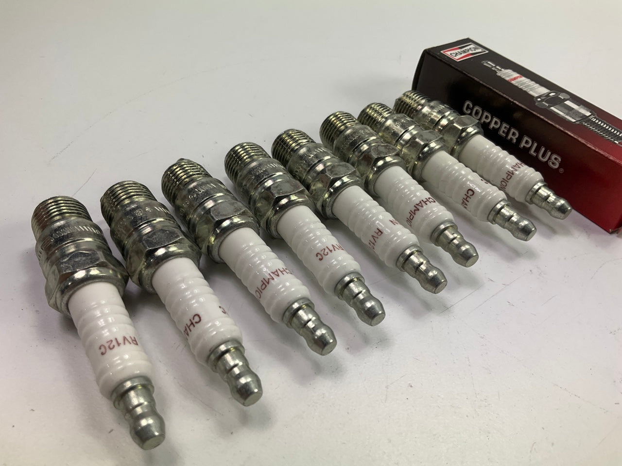 (8) Champion RV12C Copper Plus Spark Plugs
