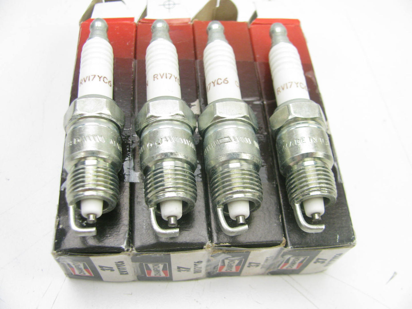 (4) Champion RV17YC6 Copper Plus Spark Plugs