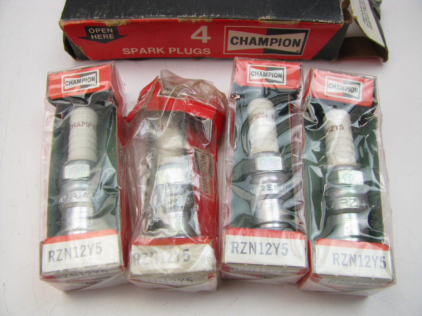 (4) Champion RZN12Y5 Ignition Spark Plugs - Copper Plus Resistor