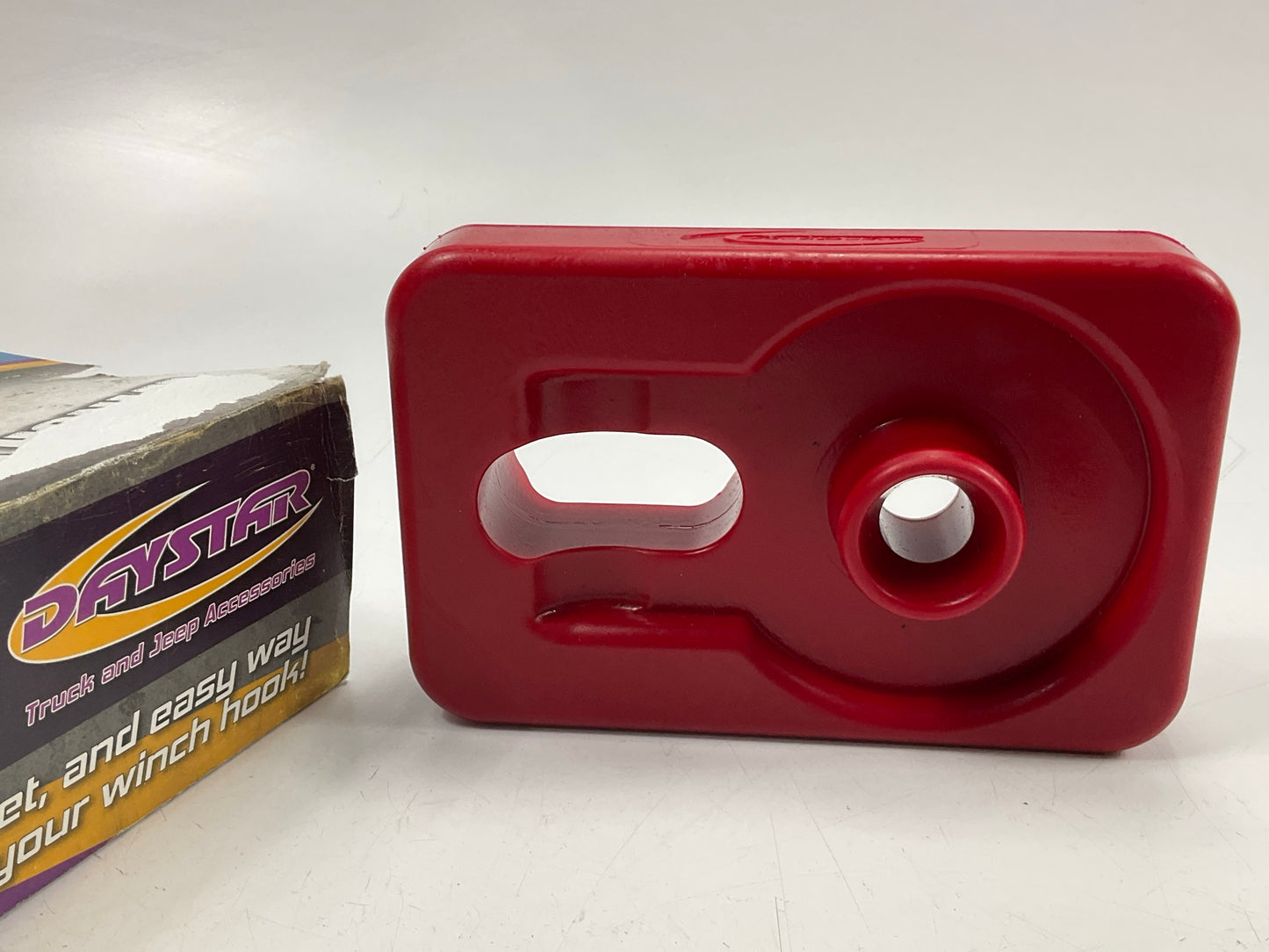 Daystar KU70039RE Winch Isolator Red W/center Detent Post