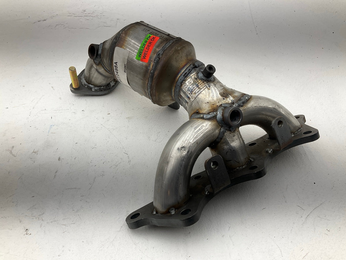 DEC MIT2498A Left Catalytic Converter With Integrated Exhaust Manifold