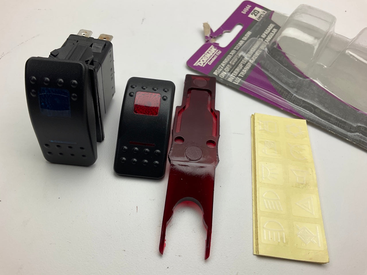 Dorman 84944 Clear Glow Rocker Switch, 20 Amp, With Red & Blue Covers