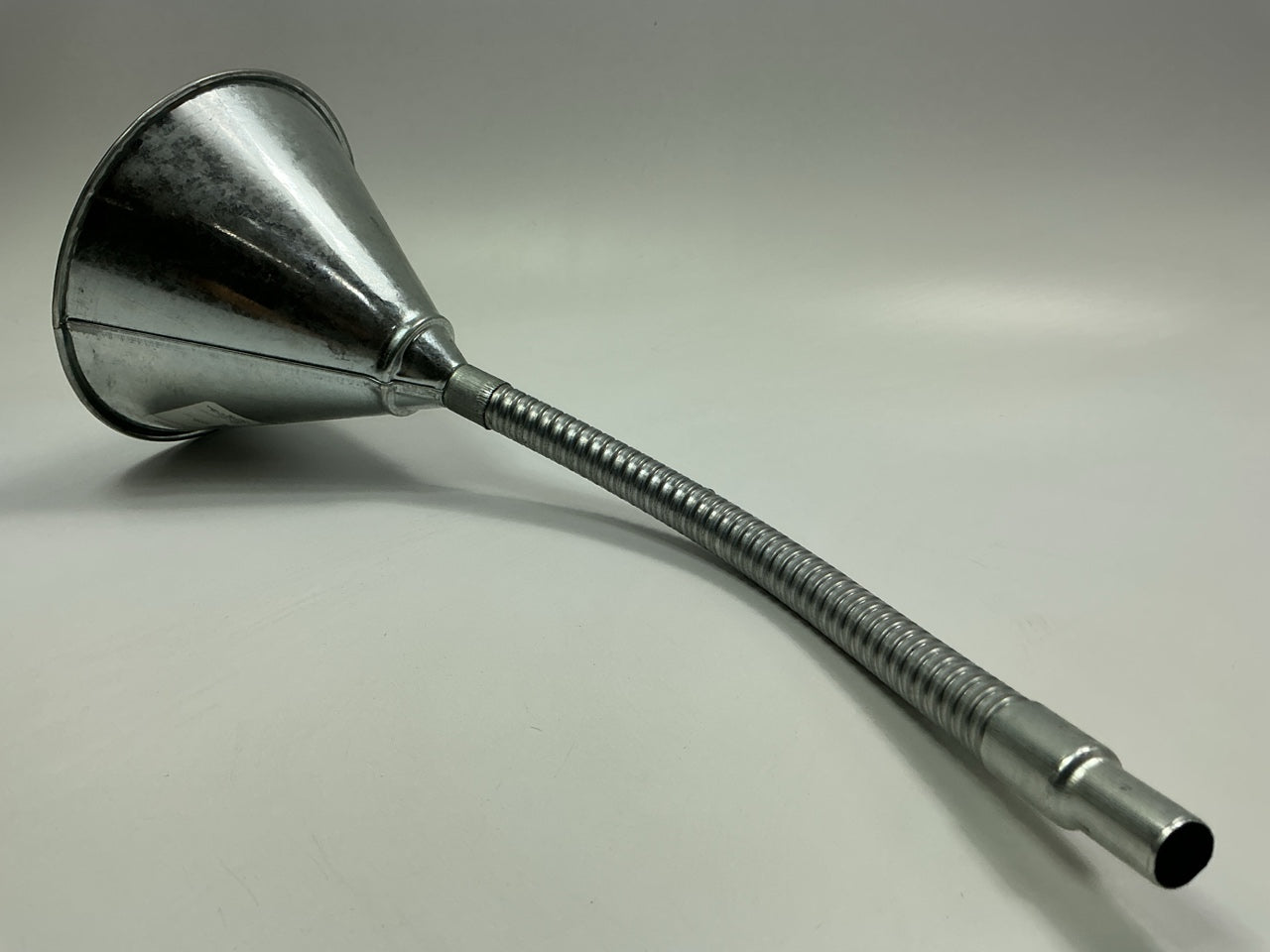 Dorman 5-1/2'' Diameter Steel Flexible Neck Funnel With 1/2'' ID #80 Mesh Screen.