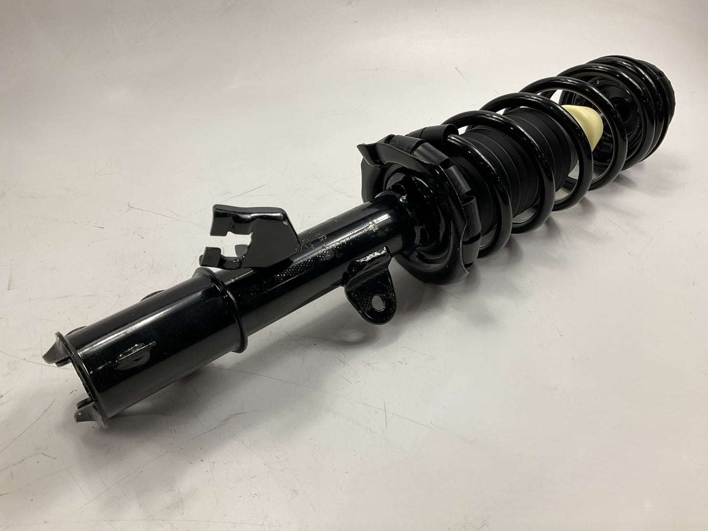 FCS 1333584R Front Right Strut With Coil Spring For 2012-2019 Nissan Versa