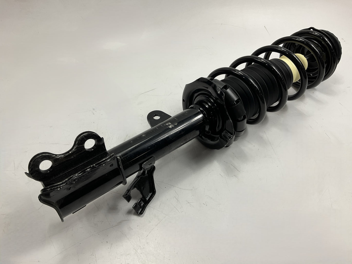 FCS 1333584R Front Right Strut With Coil Spring For 2012-2019 Nissan Versa