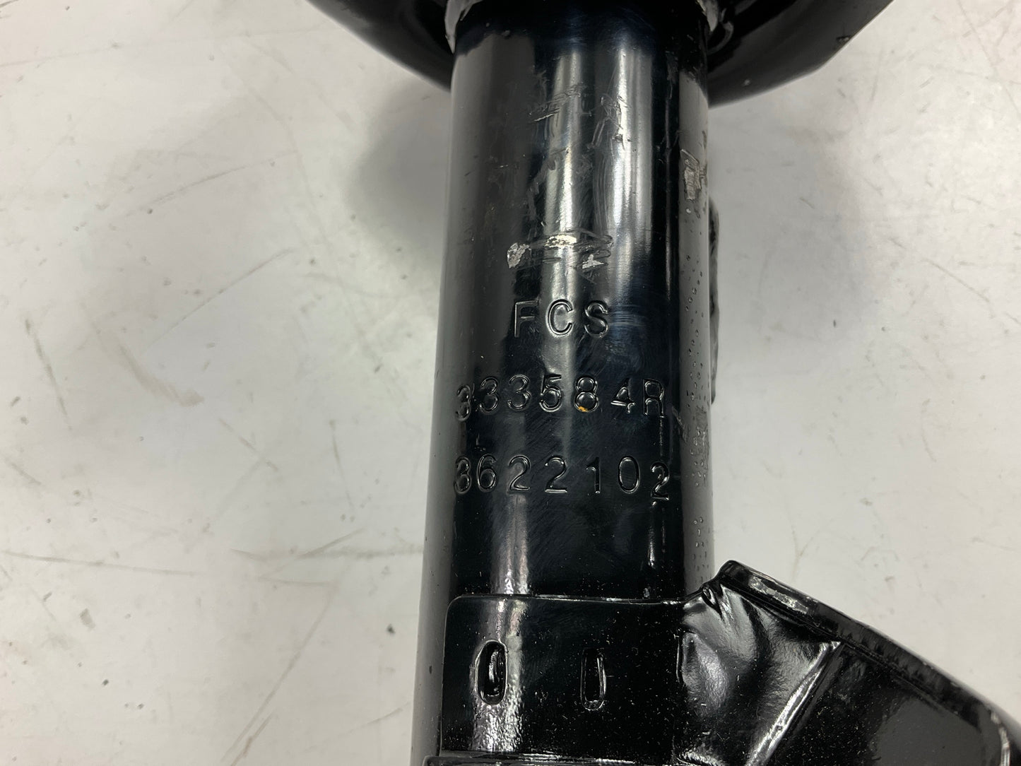 FCS 1333584R Front Right Strut With Coil Spring For 2012-2019 Nissan Versa