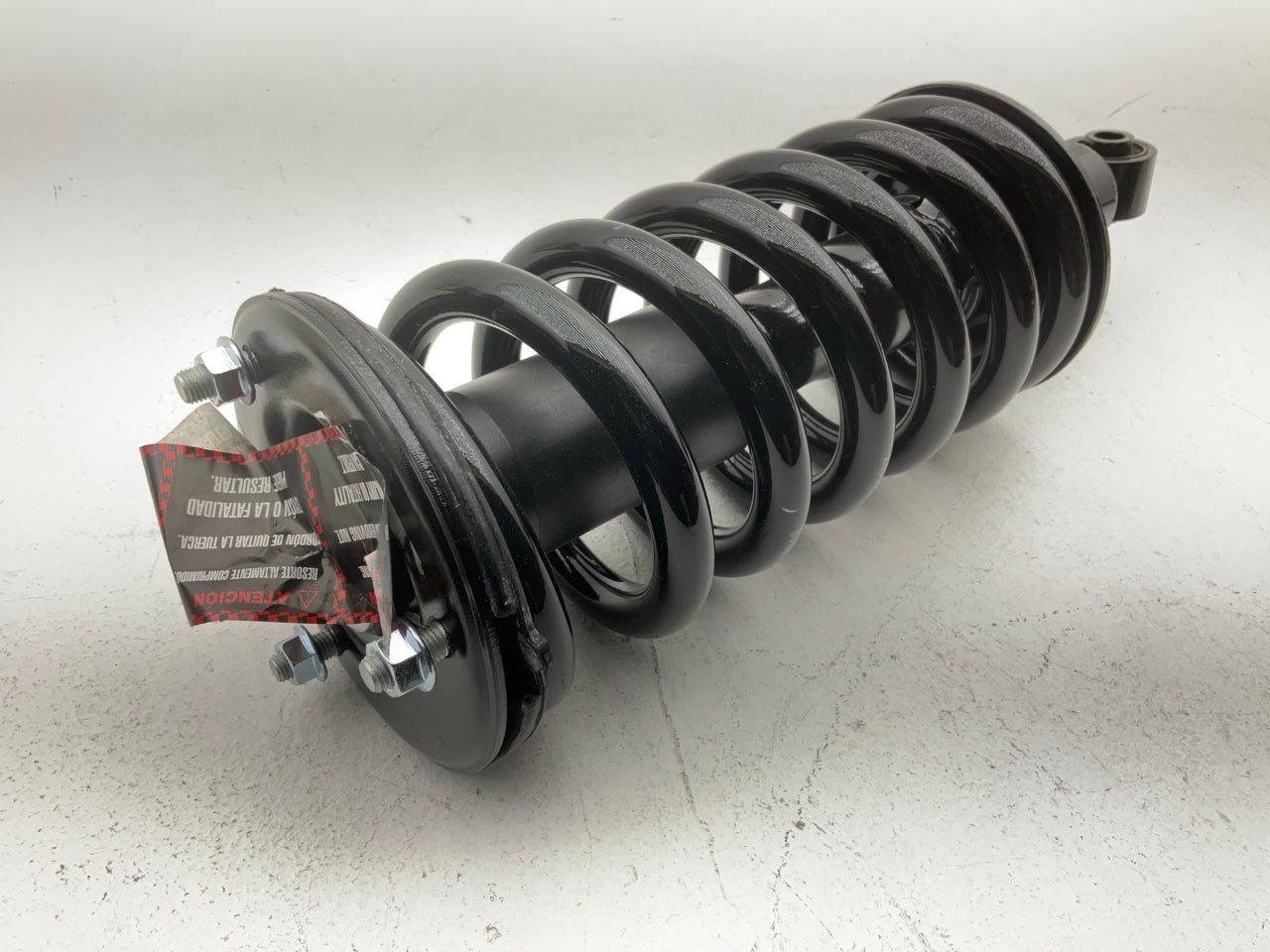 FCS FCS1345497 Front Suspension Strut And Coil Spring Assembly - 4WD ONLY
