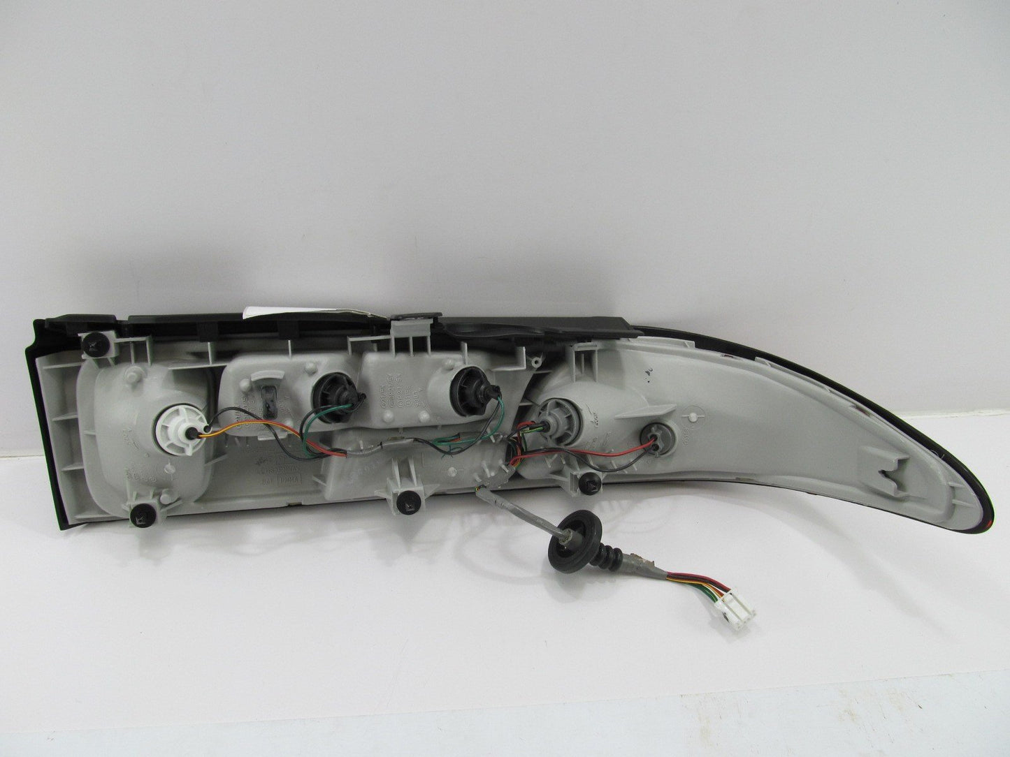 NOS OEM 1995-1997 Ford Probe LEFT (Drivers Side) Tail Light Lamp  (OUT OF BOX)