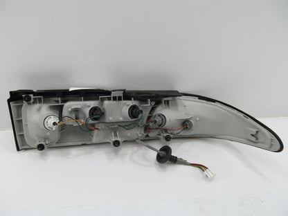 NOS OEM 1995-1997 Ford Probe LEFT (Drivers Side) Tail Light Lamp  (OUT OF BOX)