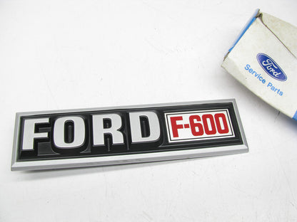 DAMAGED - OEM Ford E5HZ-16720-E-D RH ''FORD F-600'' Name Plate 1980-1990 F-600