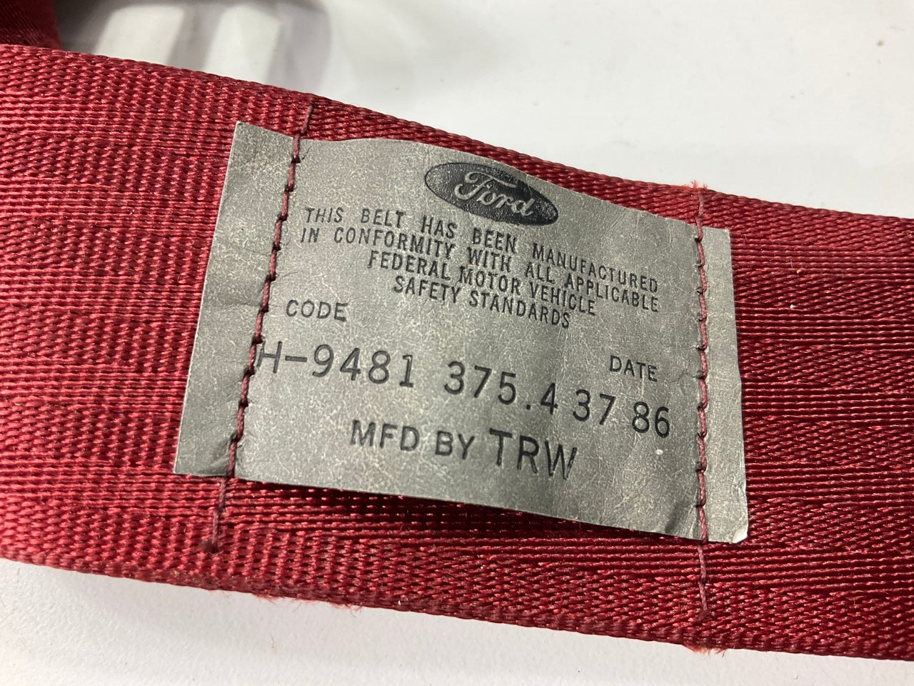 NEW - OEM Ford E6FZ-61611A73-B Front Left Seat Belt Retractor, RED 85-86 Escort