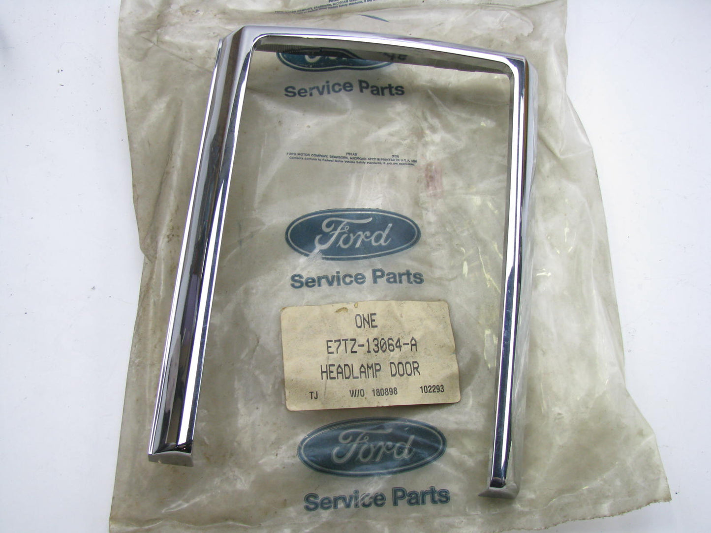 NEW - OEM Ford E7TZ-13064-A Front Right Headlamp Door 1987-91 F-Series & Bronco
