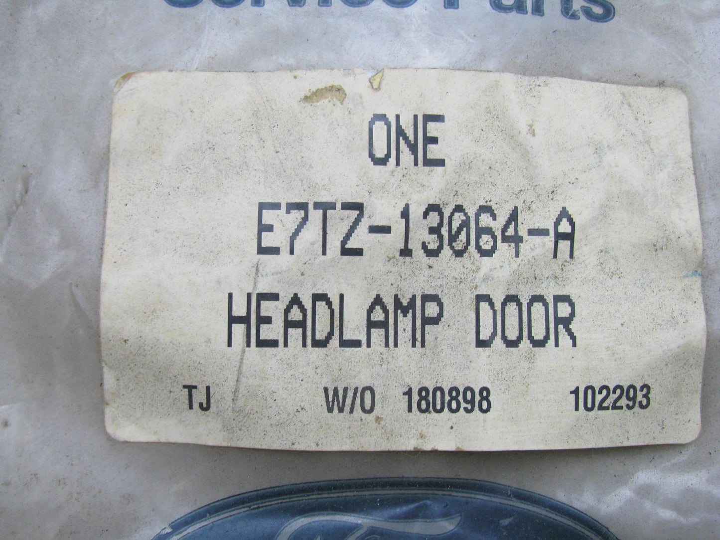NEW - OEM Ford E7TZ-13064-A Front Right Headlamp Door 1987-91 F-Series & Bronco
