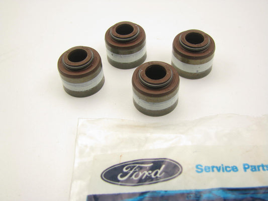 (4) NEW - OEM Ford E7ZZ-6571-A Engine Valve Stem Seals