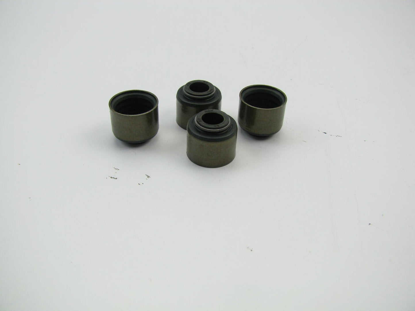 (4) NEW OEM Ford E7ZZ-6571-B EXHAUST Valve Stem Oil Seals