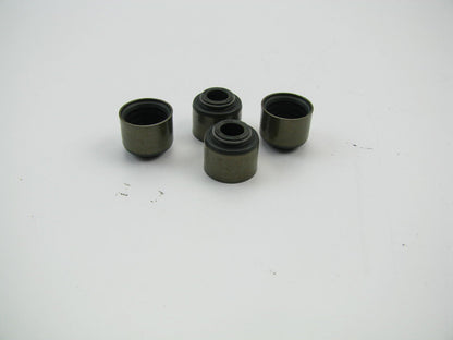 (4) NEW OEM Ford E7ZZ-6571-B EXHAUST Valve Stem Oil Seals