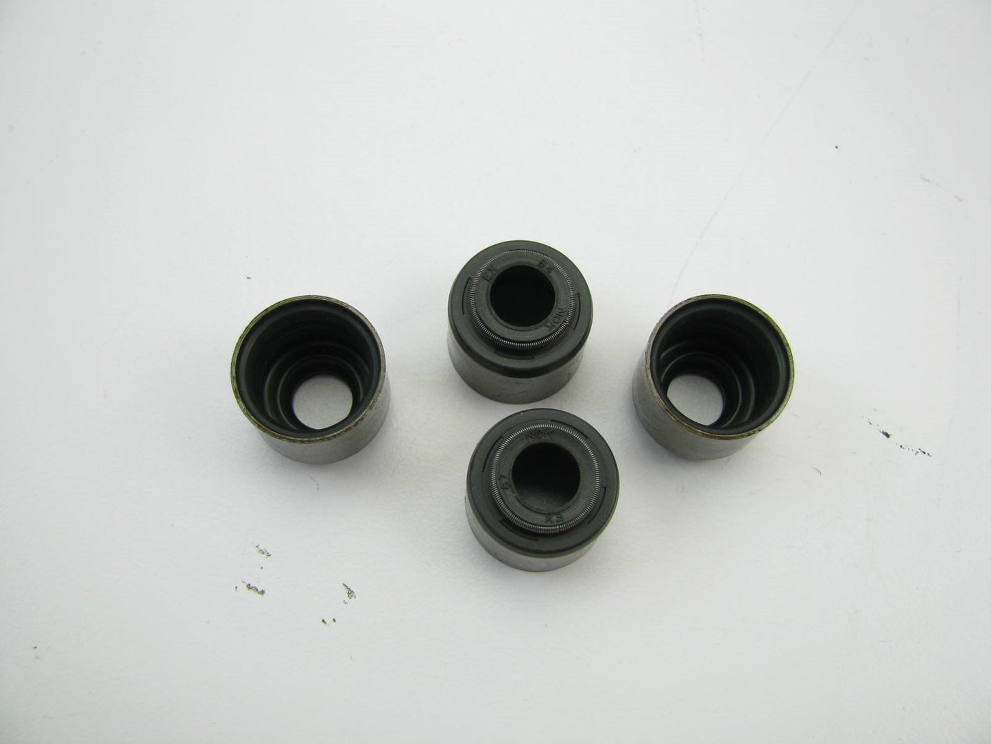 (4) NEW OEM Ford E7ZZ-6571-B EXHAUST Valve Stem Oil Seals