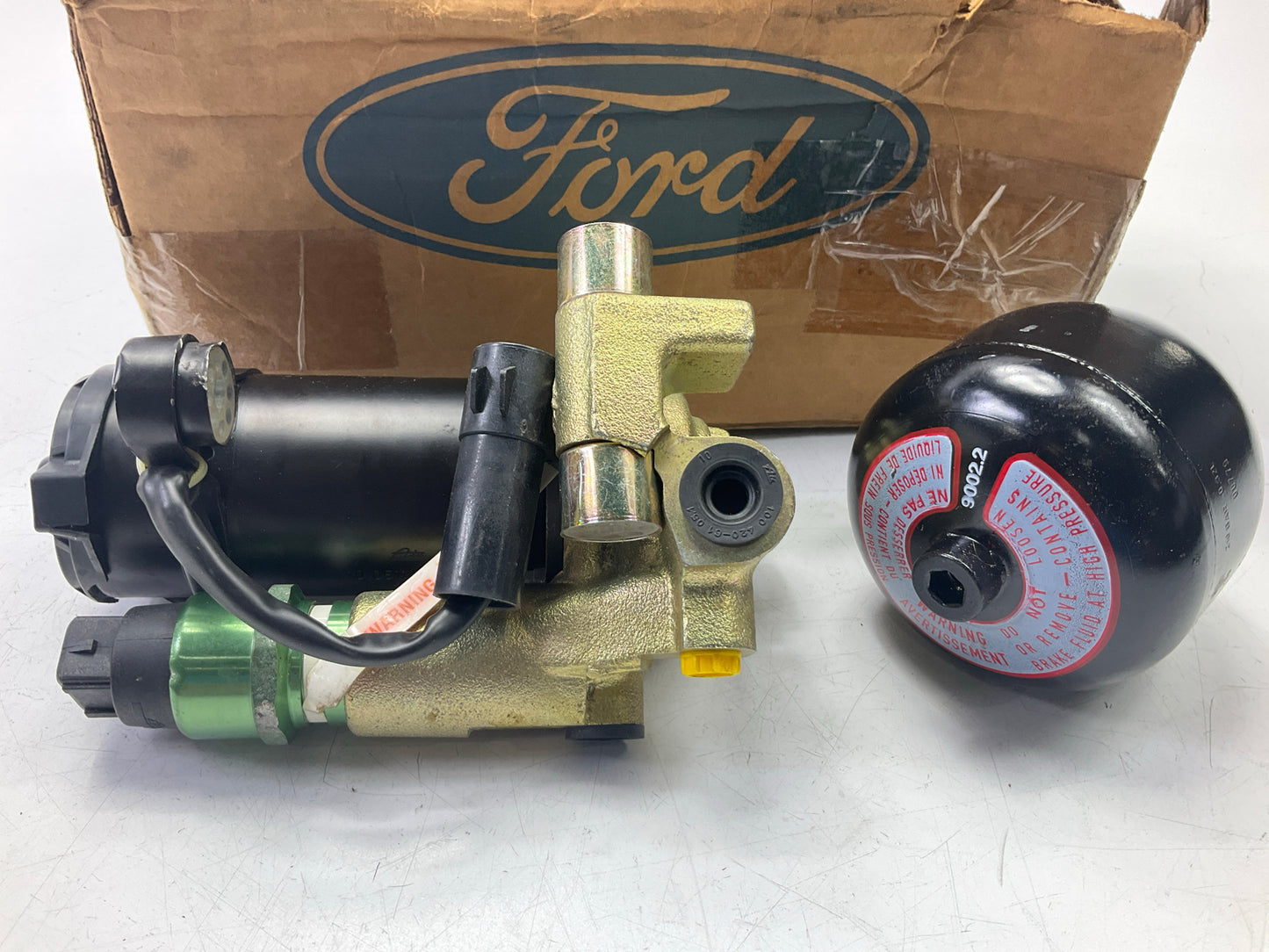 Cosmetic Damage - OEM Ford E8SZ-2C256-A Anti-lock Brake ABS Pump Motor Actuator