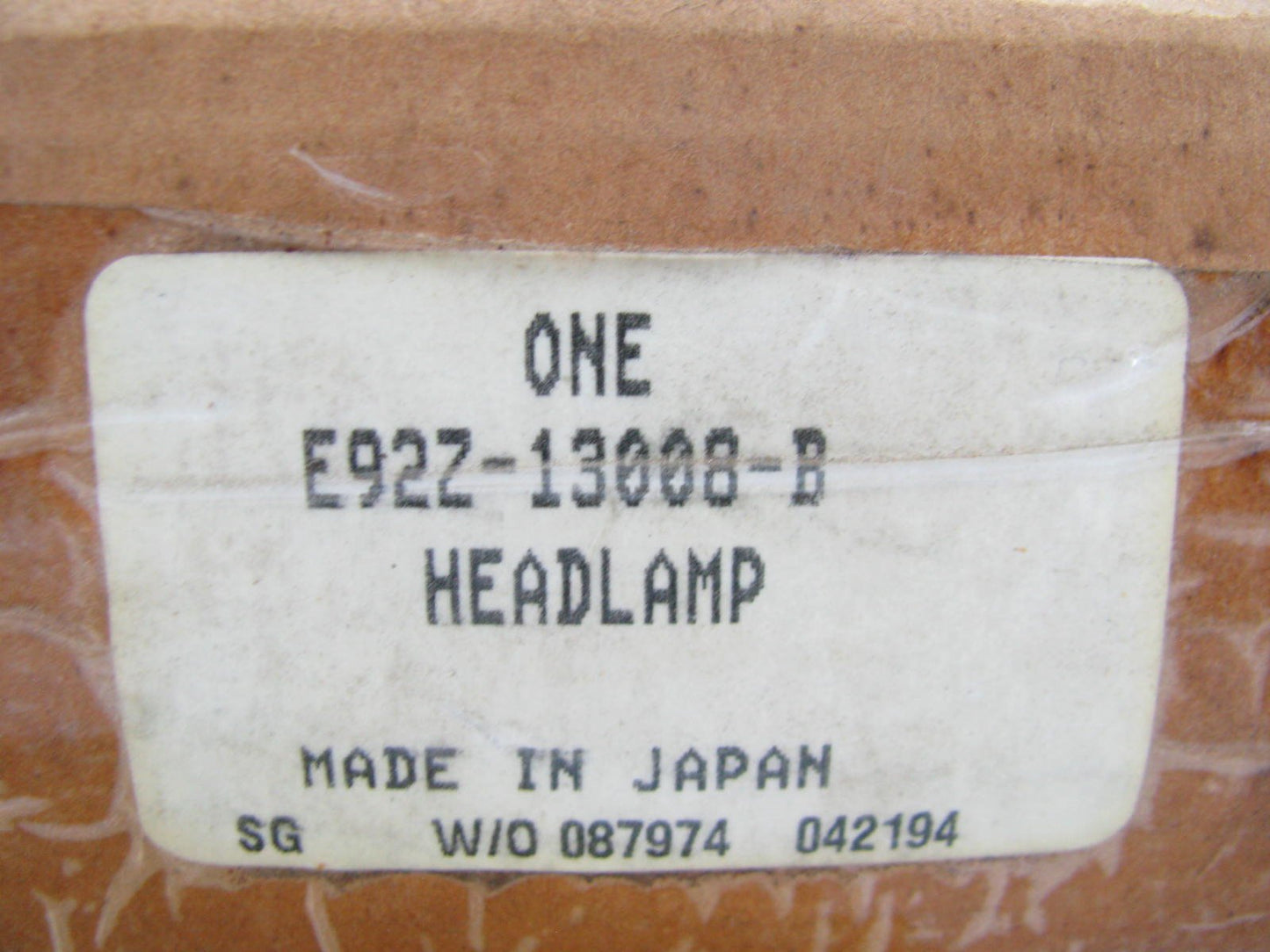 NOS - OEM E92Z-13008-B LEFT Head Lamp Light Bucket Bezel For 1989-92 Ford Probe