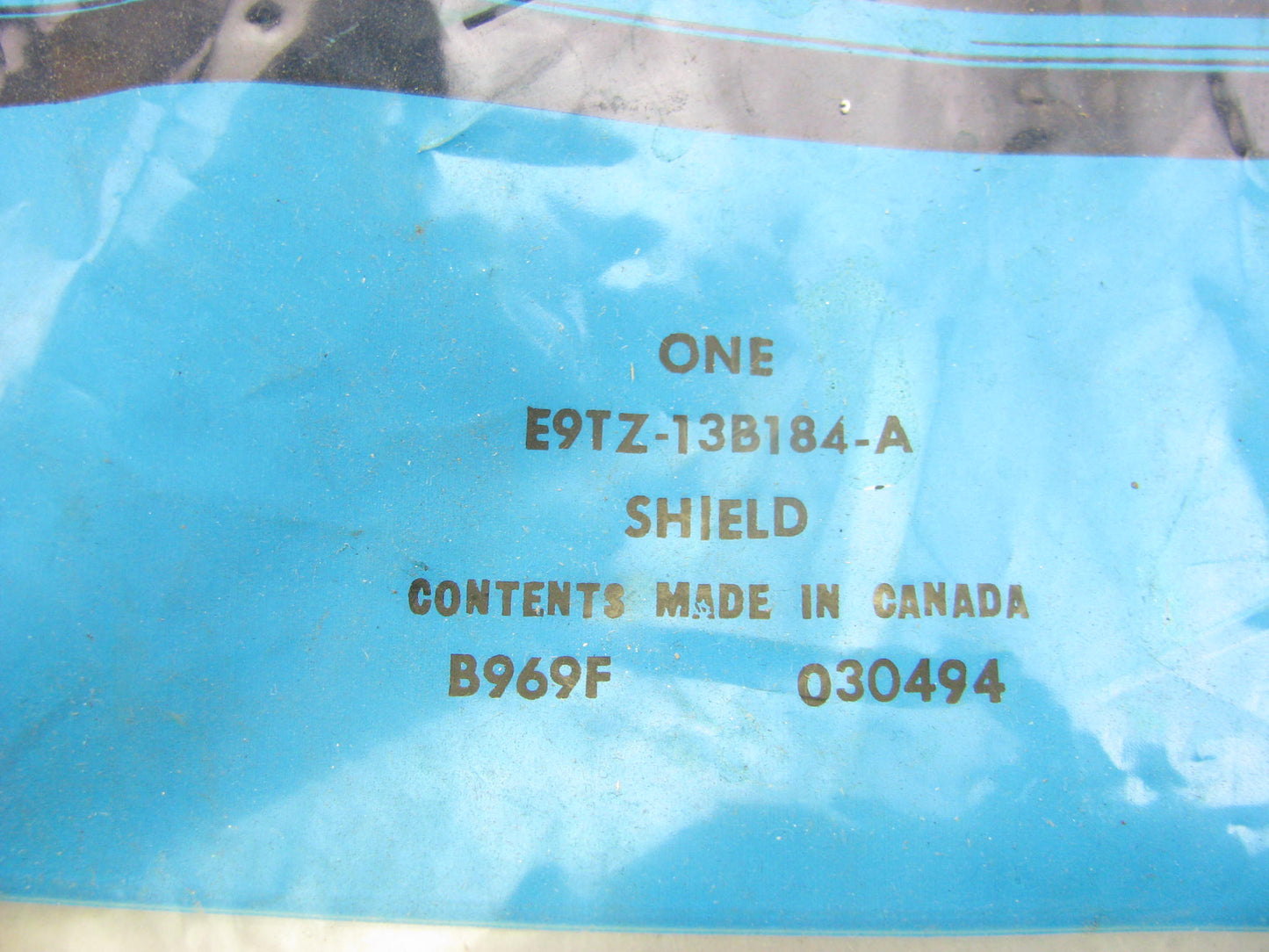 NEW - OEM Ford E9TZ-13B184-A Right Headlamp Shield 89-92 Ranger, 89-90 Bronco II