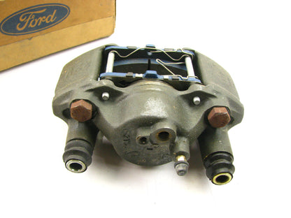 New OEM Ford Front Right Disc Brake Caliper W/ Pads 91-92 Escort, Tracer 13'' Rim