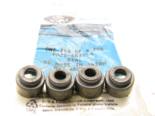 (4) NEW - OEM Ford F32Z-6571-A Valve Stem Seal Set 1993-2006 1.8L 2.0L