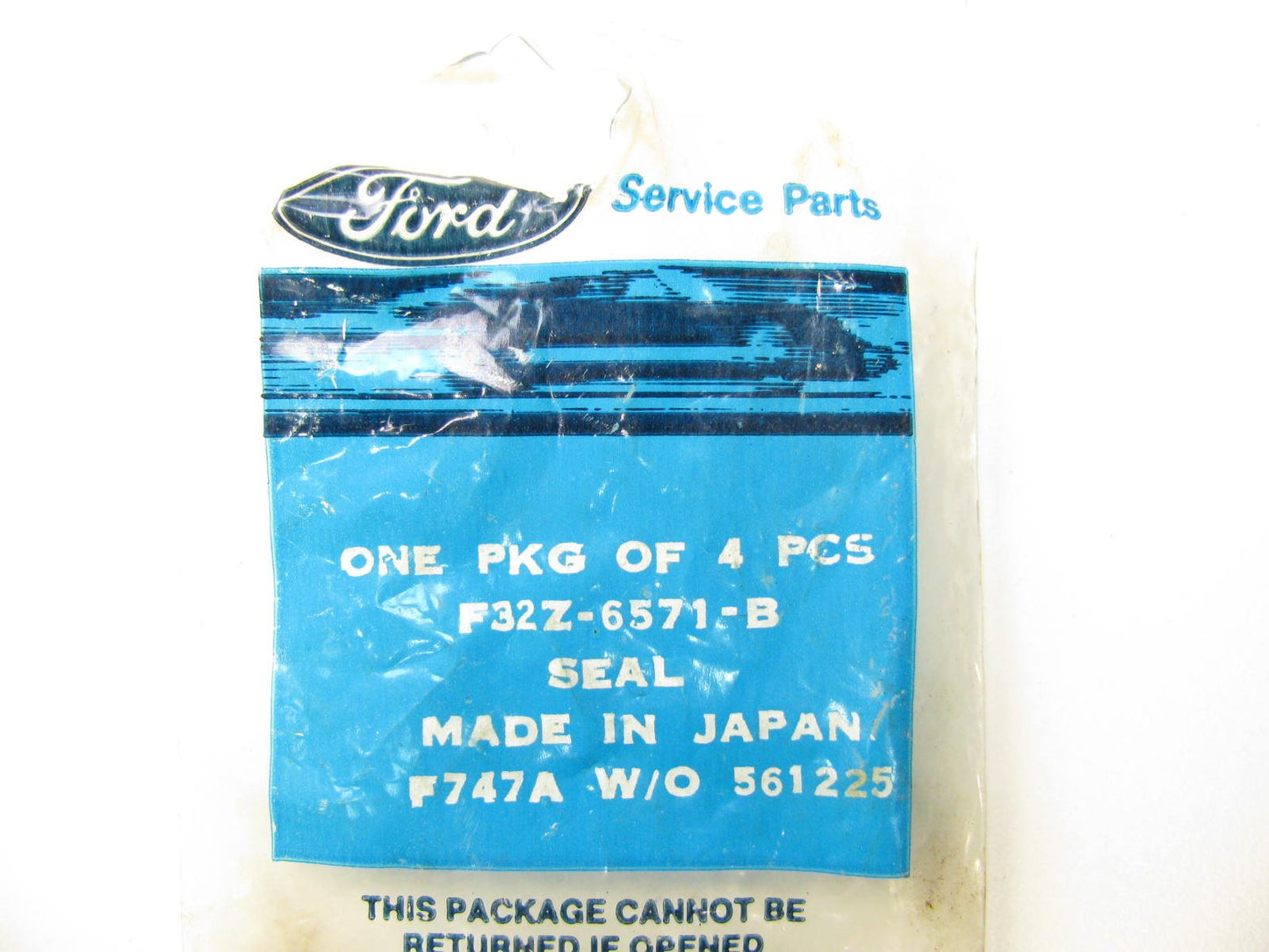 (4) NEW - OEM Ford F32Z-6571-B-4 Valves Stem Seals