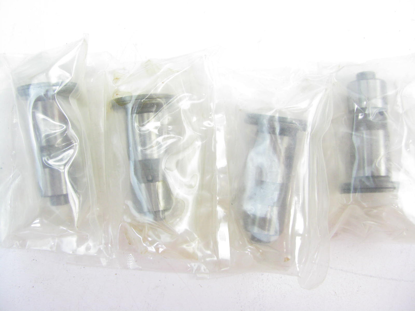 (4) NEW - OEM Ford F3XY-6500-C Engine Valve Lifters For Nissan VG30 VG33E