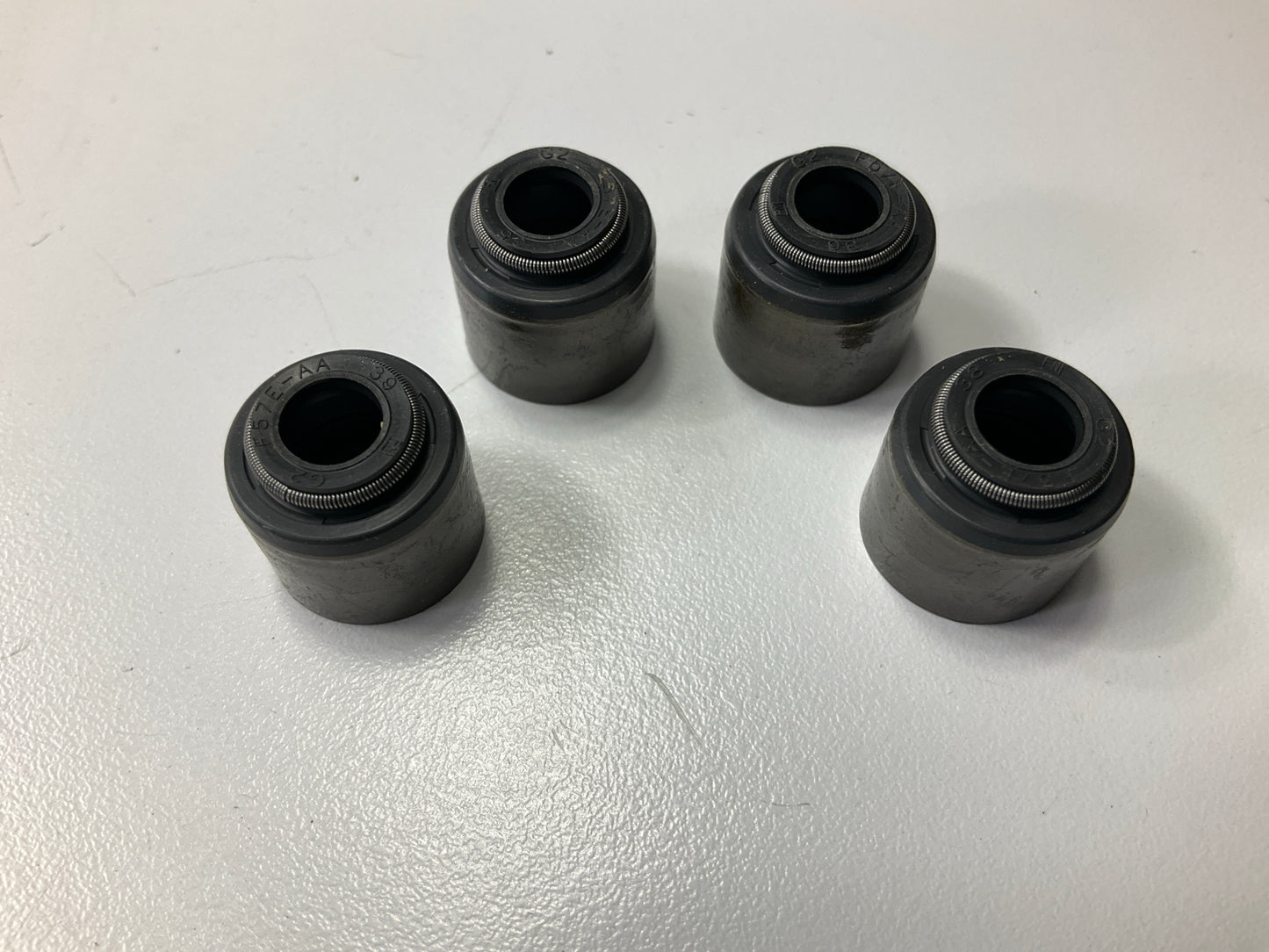 (4) NEW - OEM Ford F57Z-6571-A Engine Valve Stem Oil Seal
