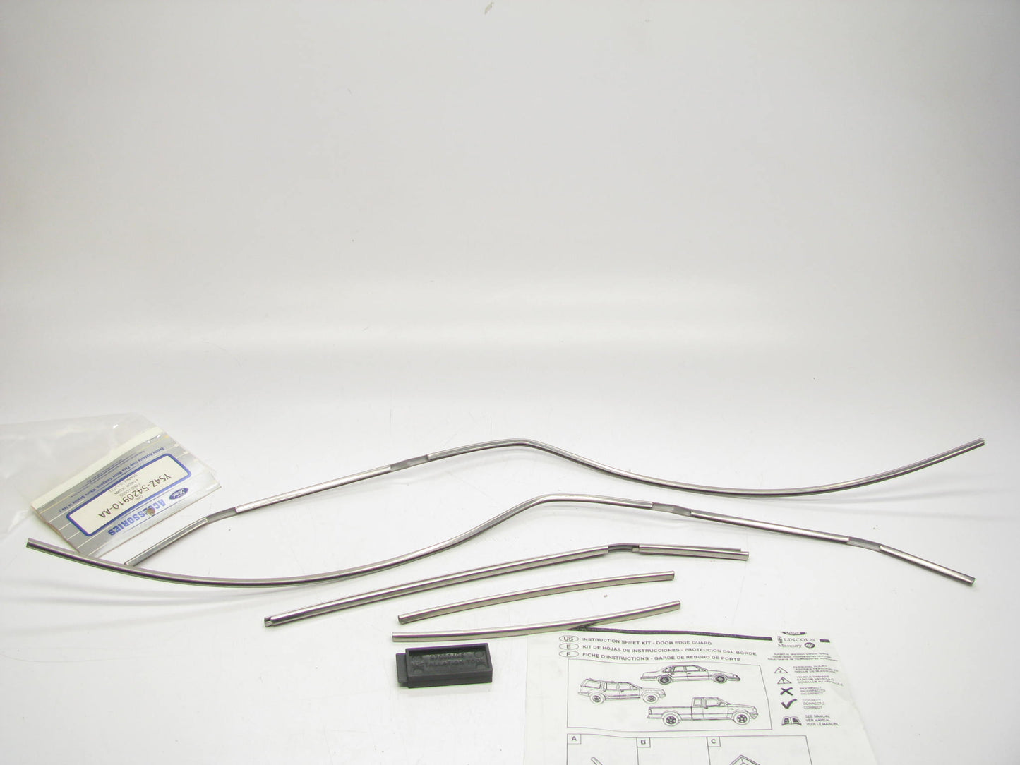 NEW - OEM Ford Stainless Steel Door Edge Guard Kit For 2000-04 Ford Focus SEDAN