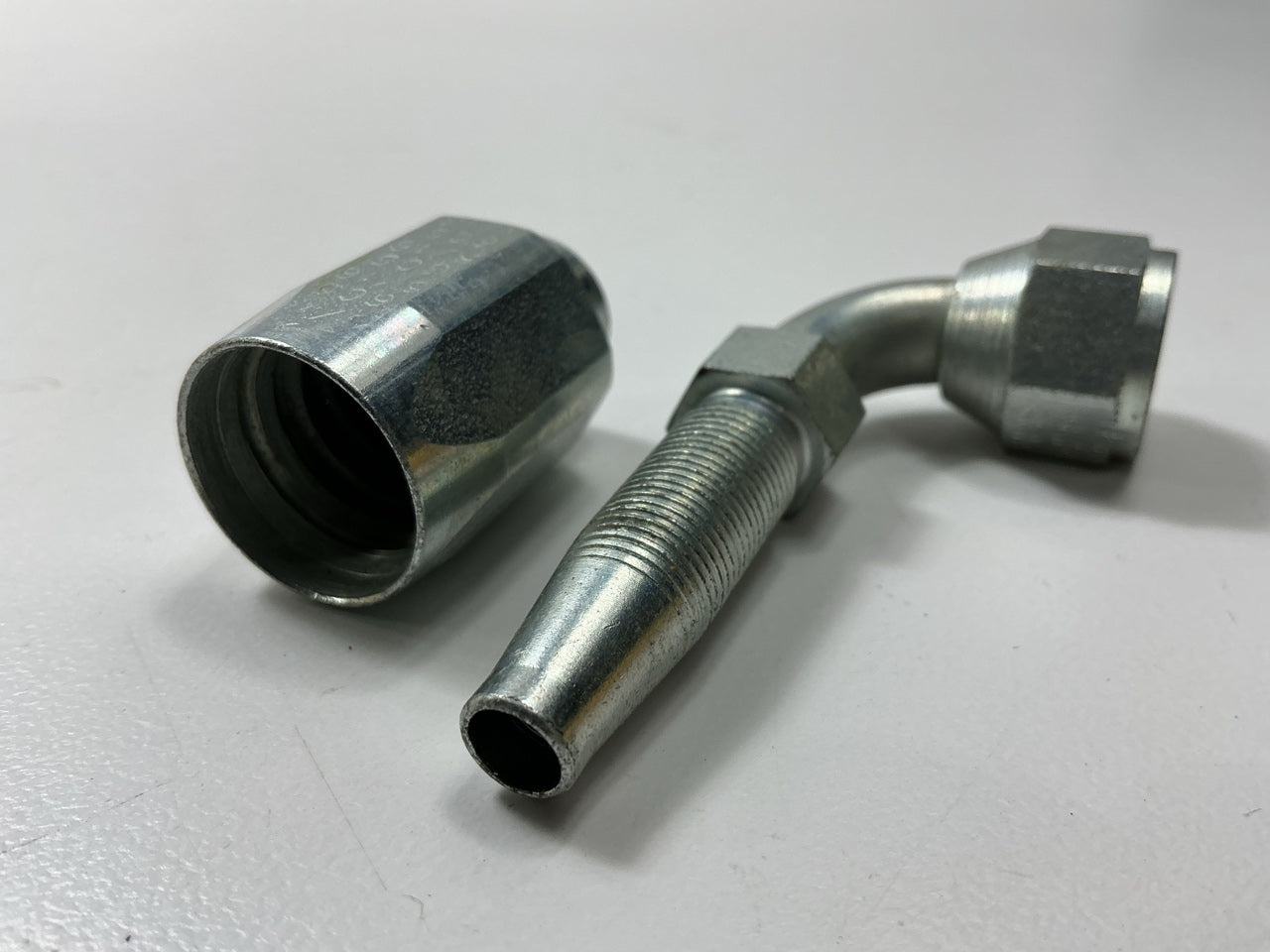 Gates G34180-0606 5/16'' Steel Female JIC 37° Flare Swivel 90° Bent Tube Fitting