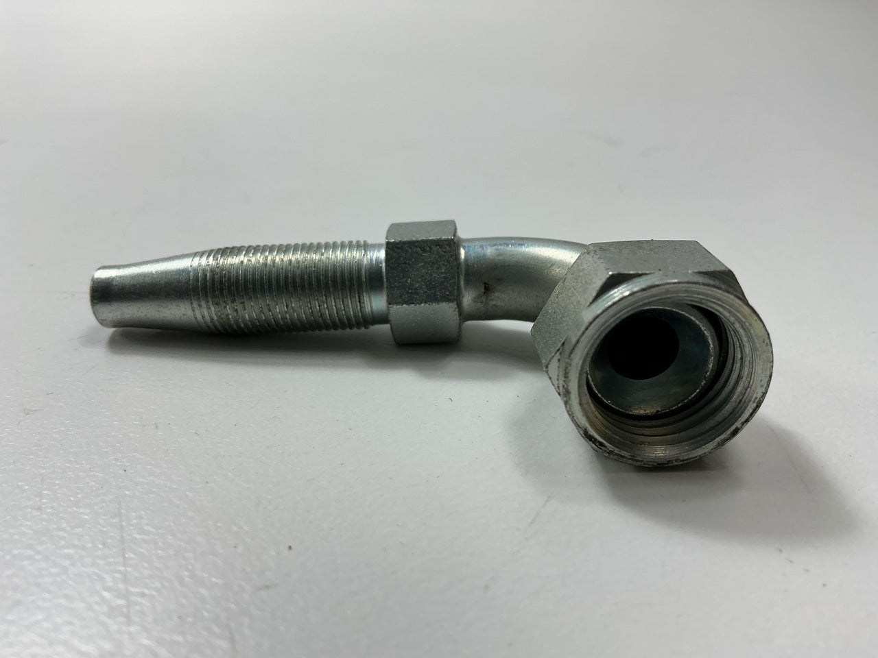Gates G34180-0606 5/16'' Steel Female JIC 37° Flare Swivel 90° Bent Tube Fitting