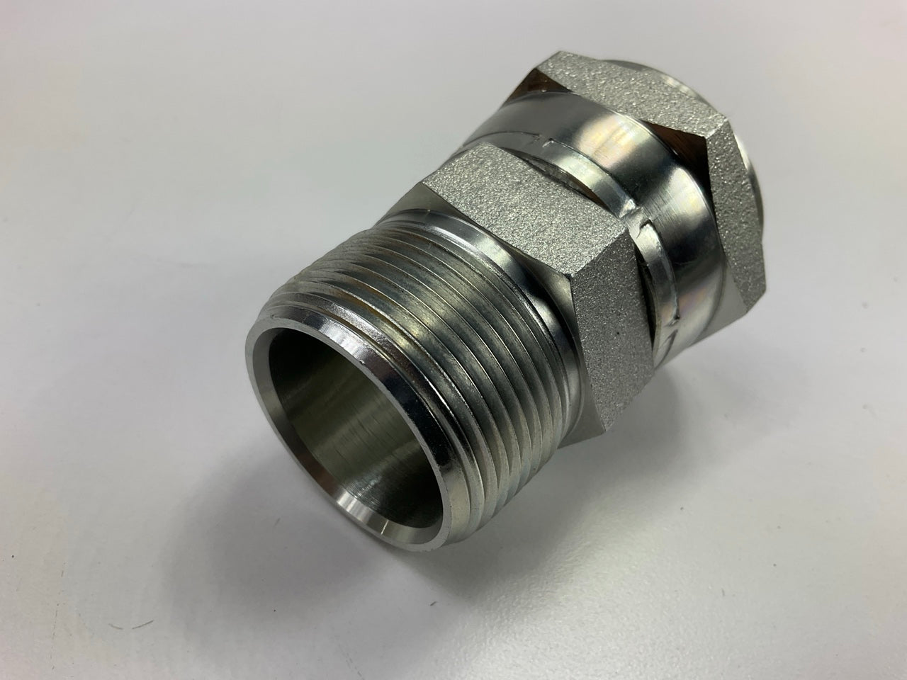 Gates G60520-2020 Female JIC 37° Flare Swivel To Male Pipe NPTF - 20FJX-20MP