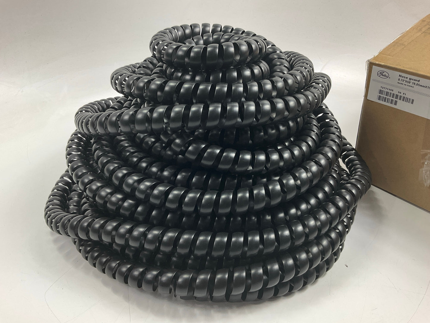 Gates G81900-0012 3/4'' Plastic Protective Coil Hydraulic Hose Guard Sleeve 50'