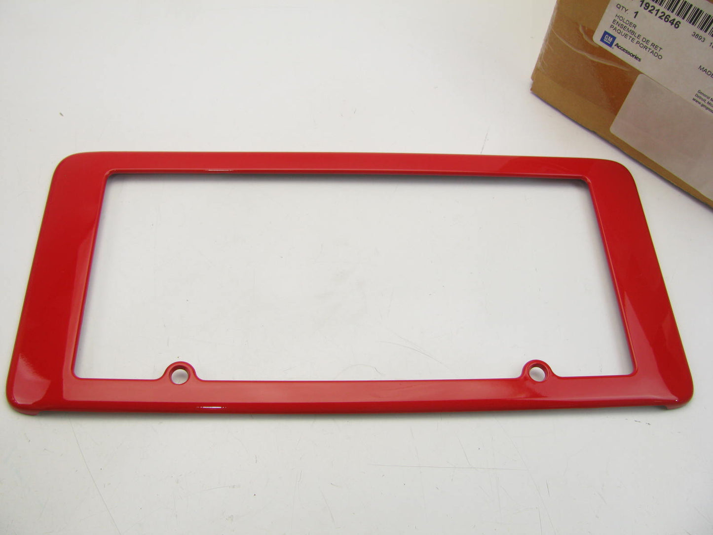 NOS OEM GM Torch Red Rear License Plate Holder For 05-13 C6 Corvette 19212646