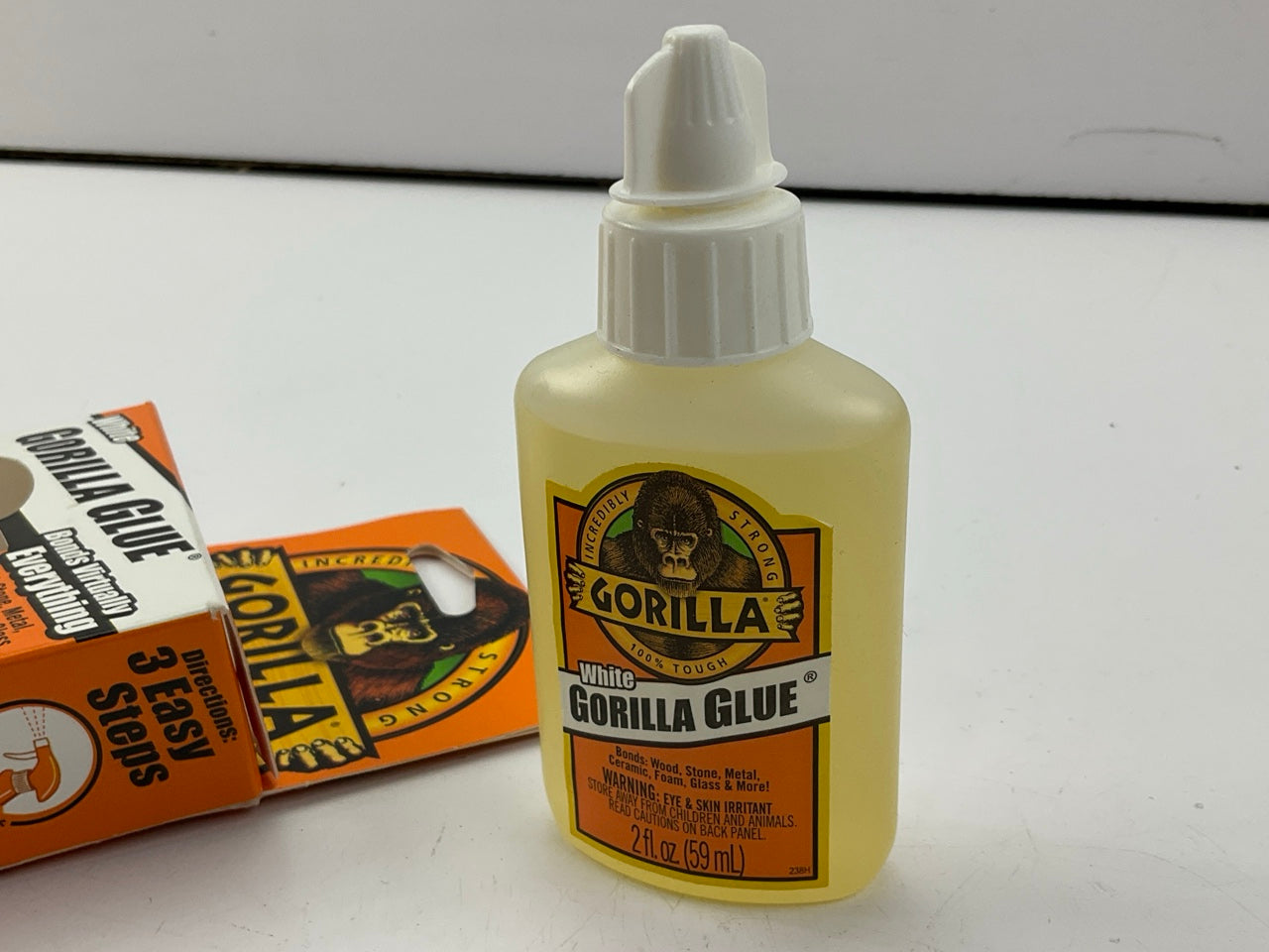 Gorilla Glue White Original Strong Bonds Wood Stone Metal Glass Waterproof, 2 Oz