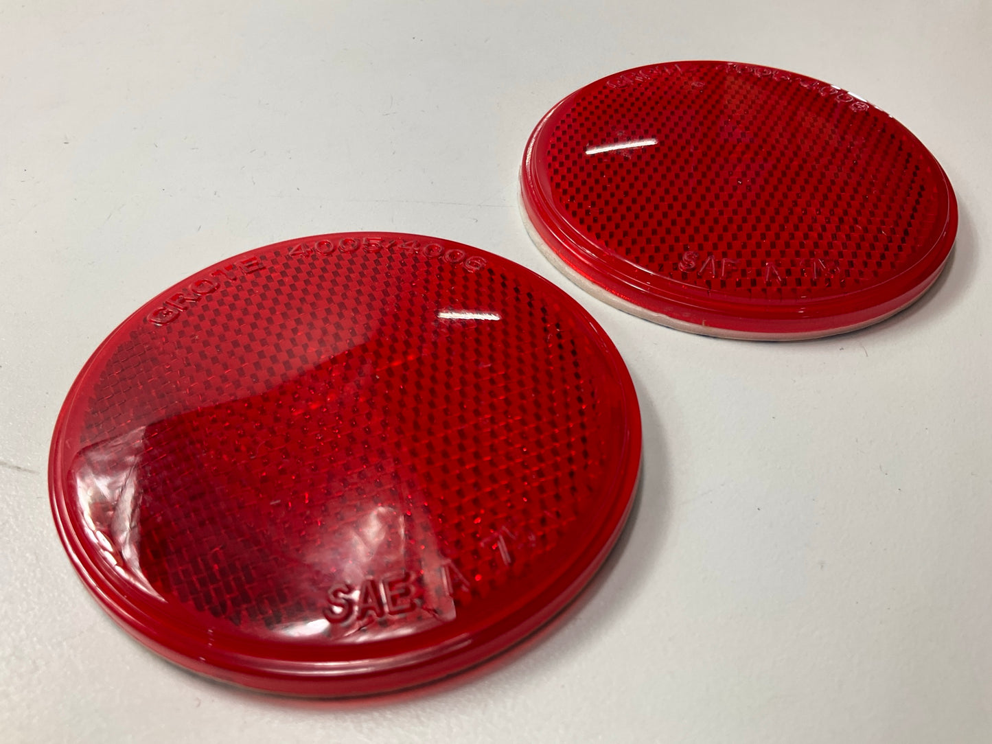 (2) Grote 40062 Sealed 3'' Round Stick-On Reflectors, Red