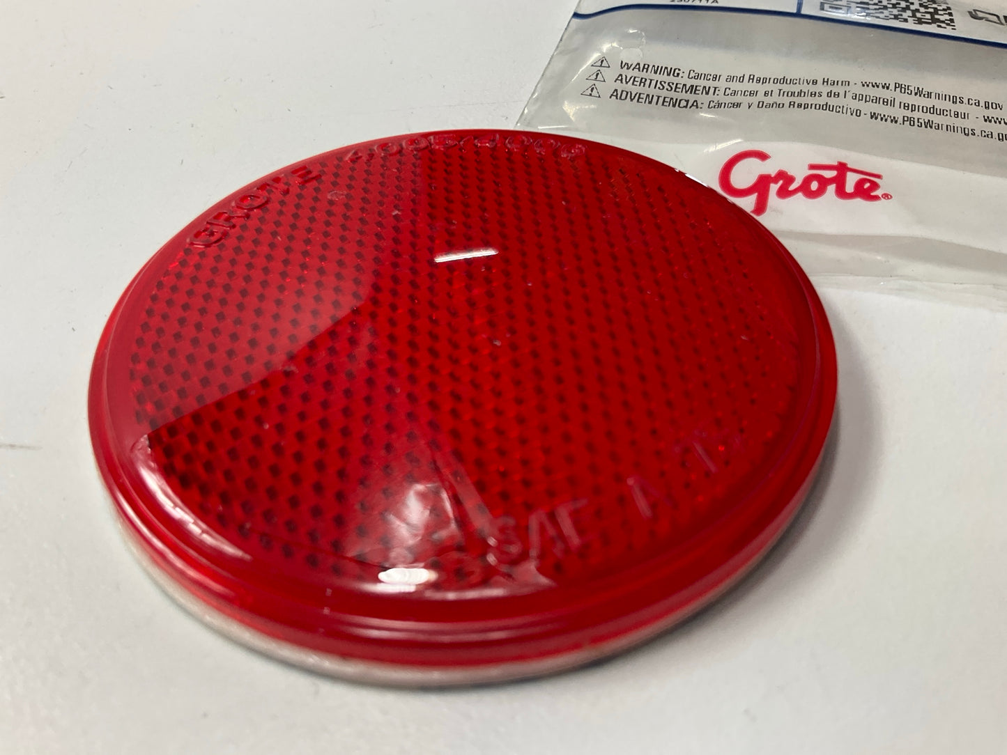 Grote 40062 Sealed 3'' Round Stick-On Reflectors, Red